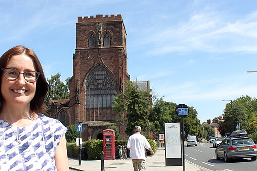 Mary Davies in front of Shrewsbury Abbey