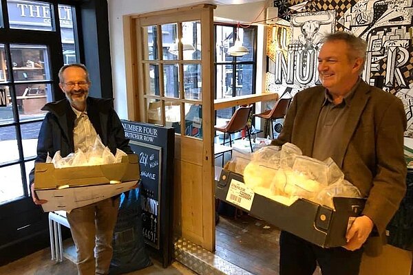 David Vasmer and Nat Green delivering flour