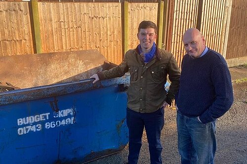 Alex Wagner & Jon Tandy by a skip in Harlescott