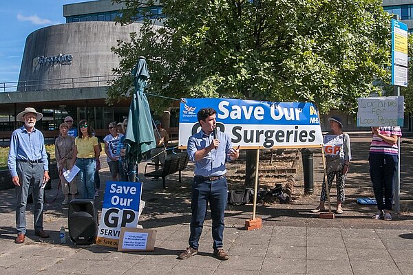 Alex Wagner speaking at a save our GP surgeries event
